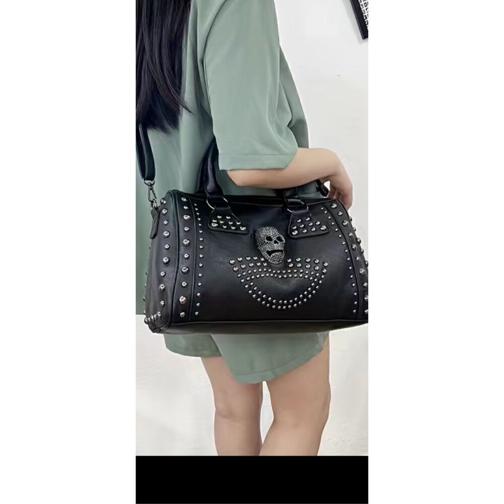 Large Skull pocket book / Studded  bag. Lots of room  super cool looking